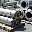 Various galvanized circular duct silencers.